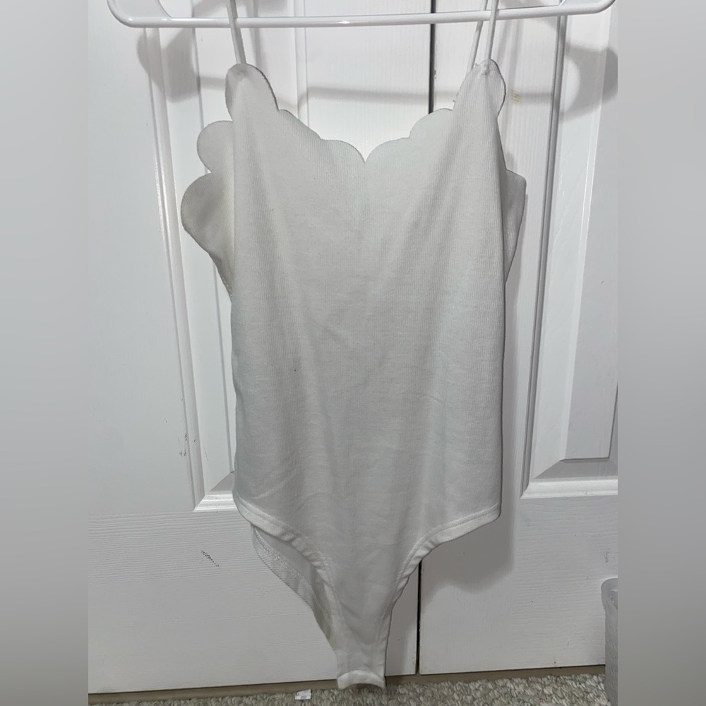 White body suit with lace open back